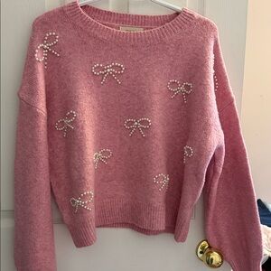 Elegant Pink Sweater with Pearl Bow Accents